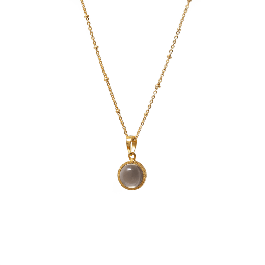 A gold chain necklace with a smoky quartz round stone.